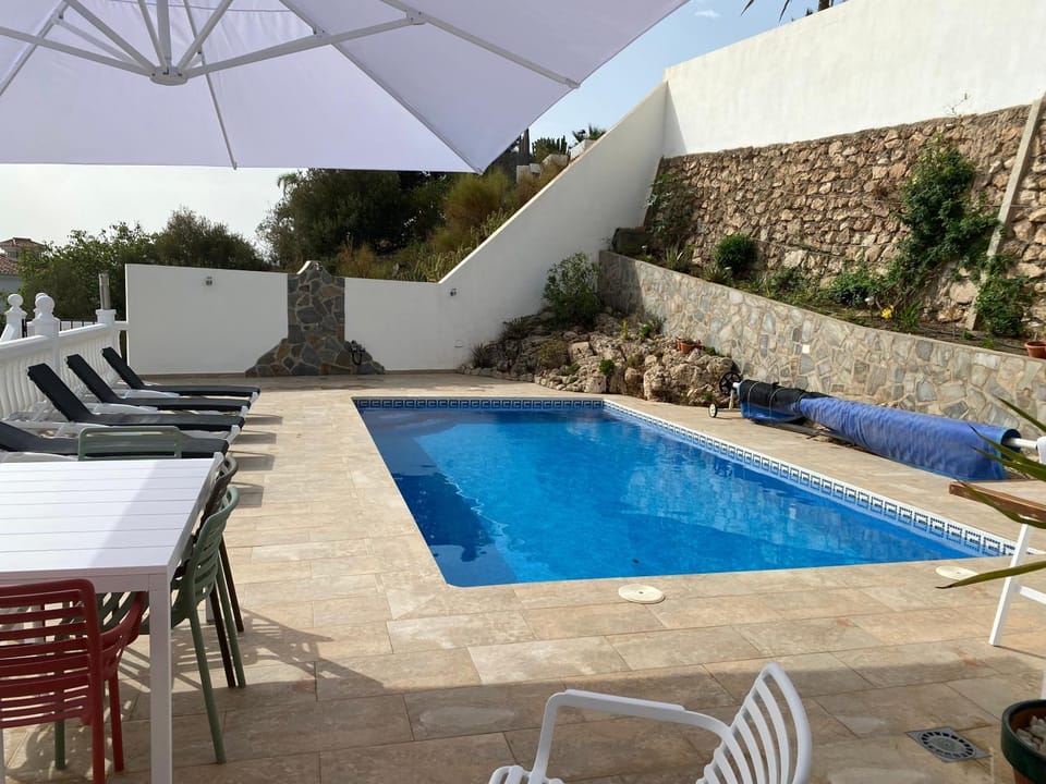 Property building, Living room, Swimming pool
