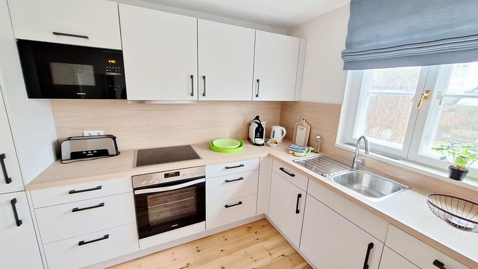 Landhaus-Rosenhof-Wohnung-1 Apartment in Nordfriesland