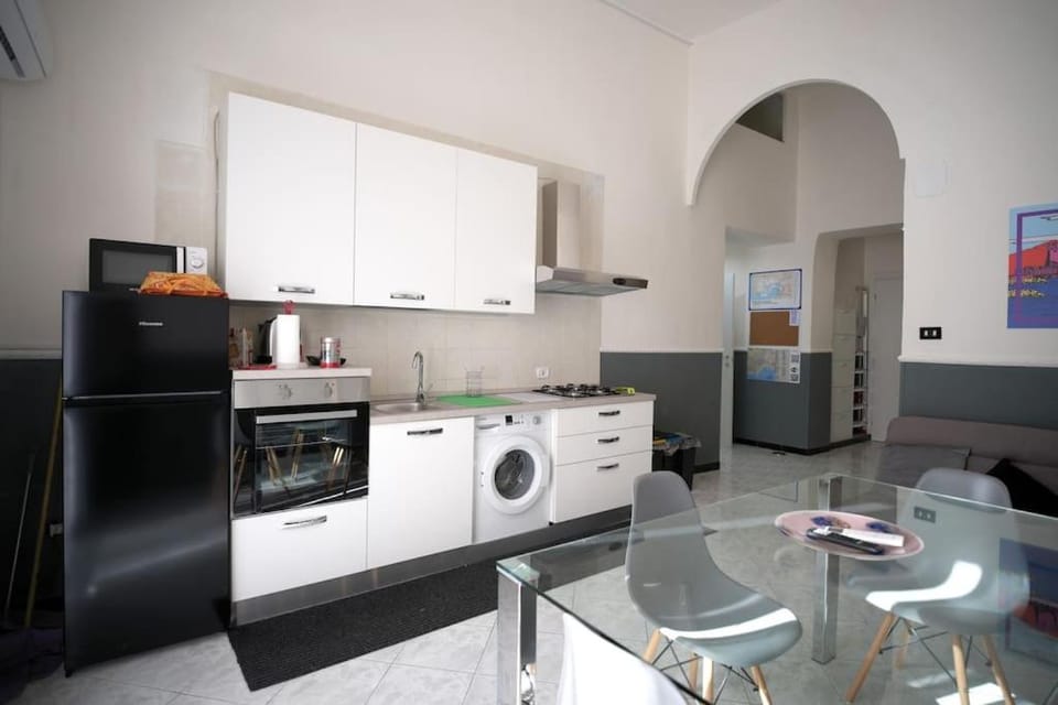Kitchen or kitchenette, washing machine