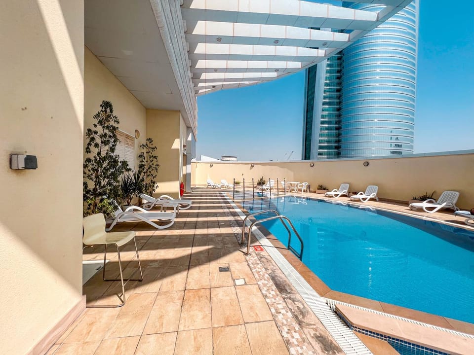 Swimming pool, sunbed