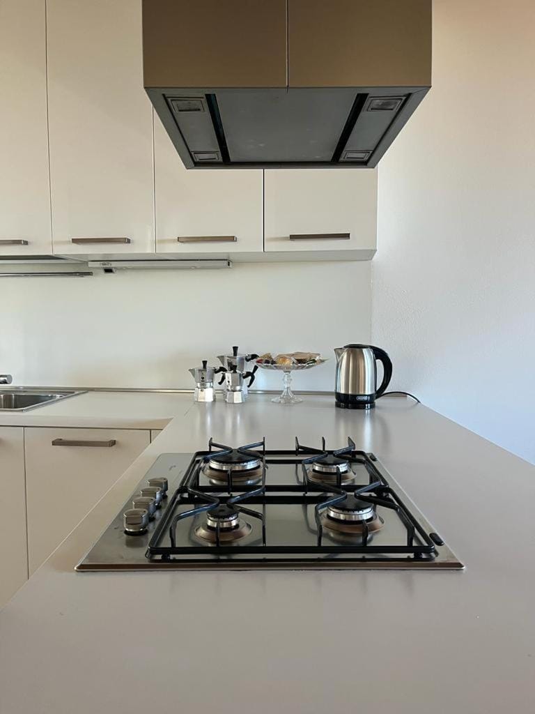 Kitchen or kitchenette, stove
