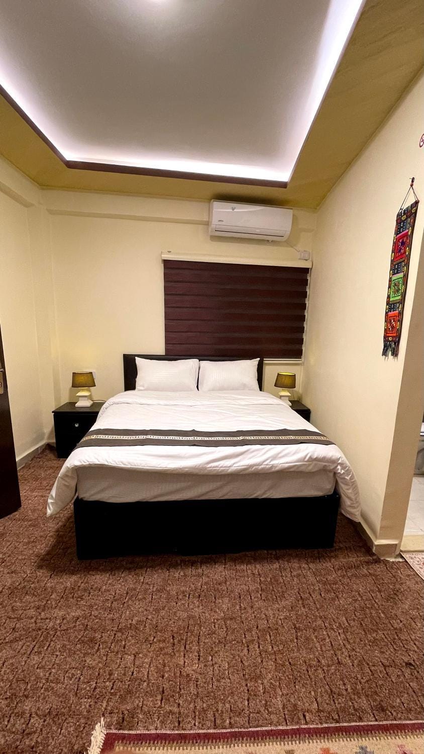 Bed, air conditioner