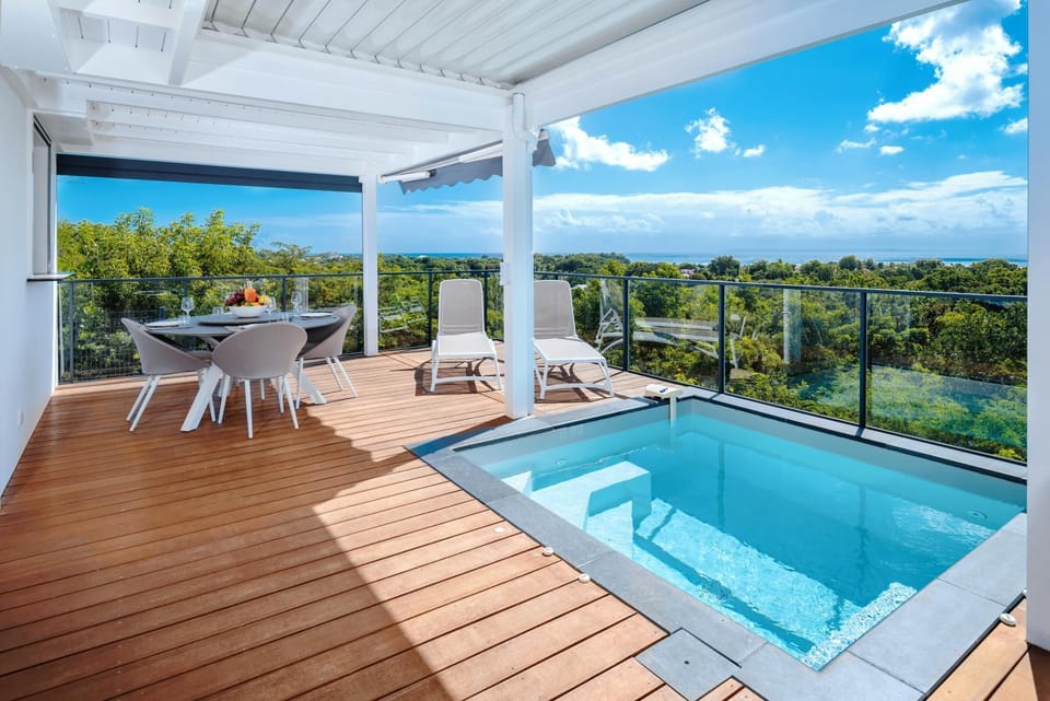 Patio, Natural landscape, Dining area, Pool view, Sea view, Swimming pool, sunbed