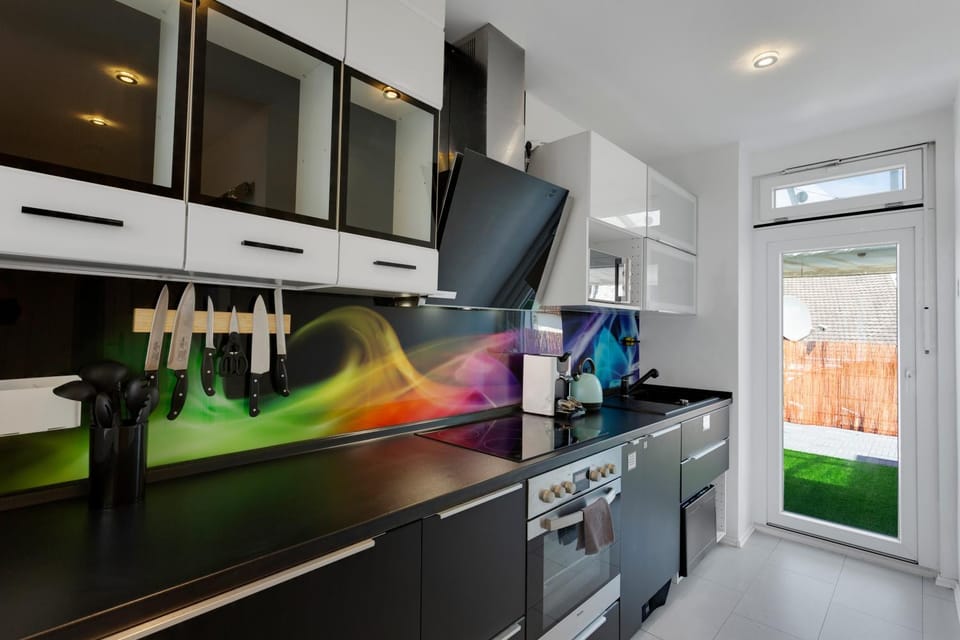 Kitchen or kitchenette, dishwasher, oven, stove, kitchen