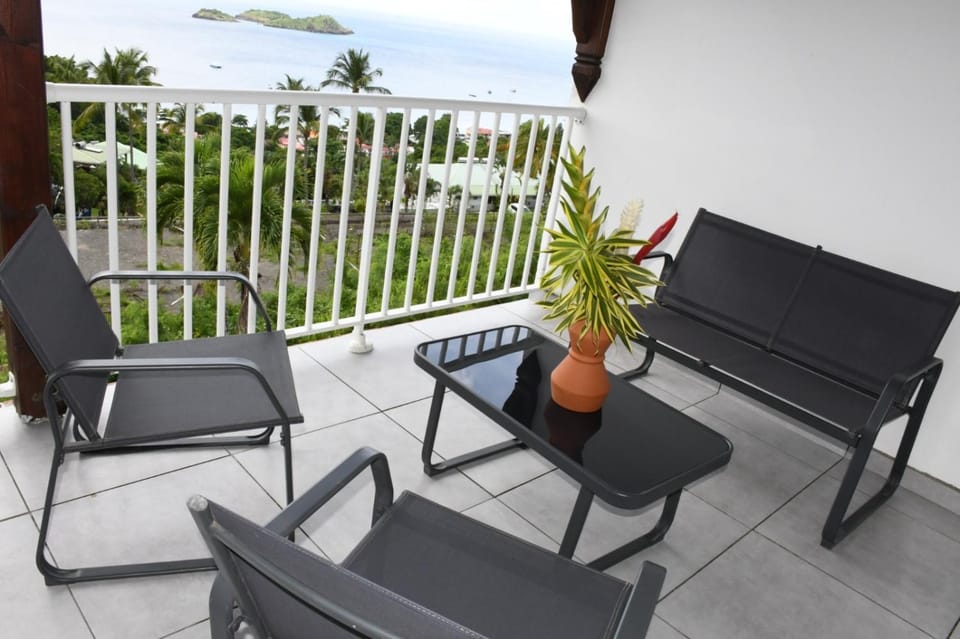 Duplex Rose Porcelaine - Vue Mer- Malendure Apartment in Bouillante