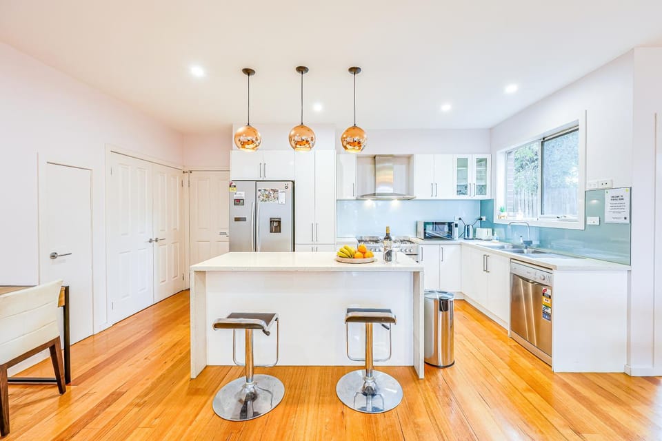 Kitchen or kitchenette, dishwasher, oven, stove