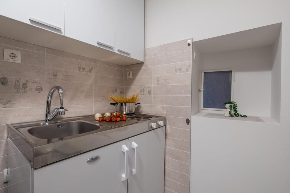 Kitchen or kitchenette, stove