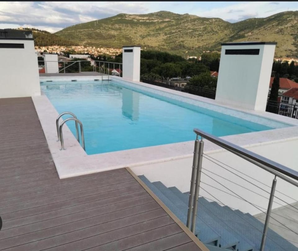 Swimming pool, sunbed