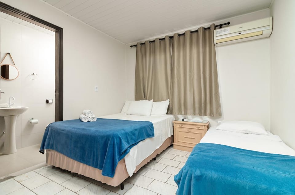 Bed, Photo of the whole room, Bedroom, towels, air conditioner