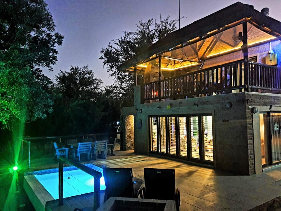 Property building, Night, Pool view, Swimming pool