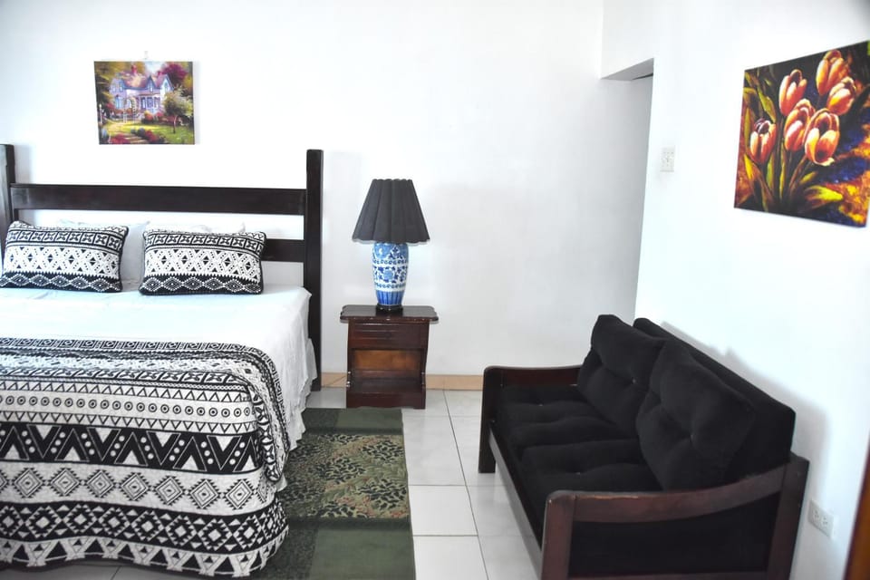 Bed, Seating area, Bedroom