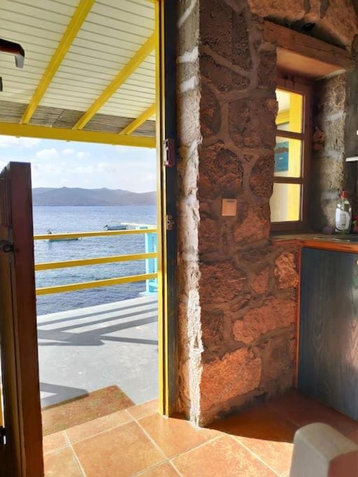 The Yellow Boat House Apartment in Milos