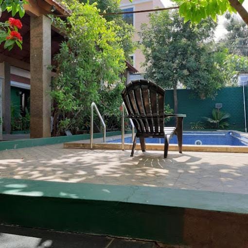 Swimming pool, sunbed
