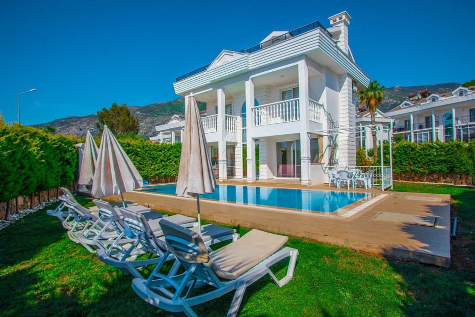 Property building, Patio, Seating area, Swimming pool, sunbed