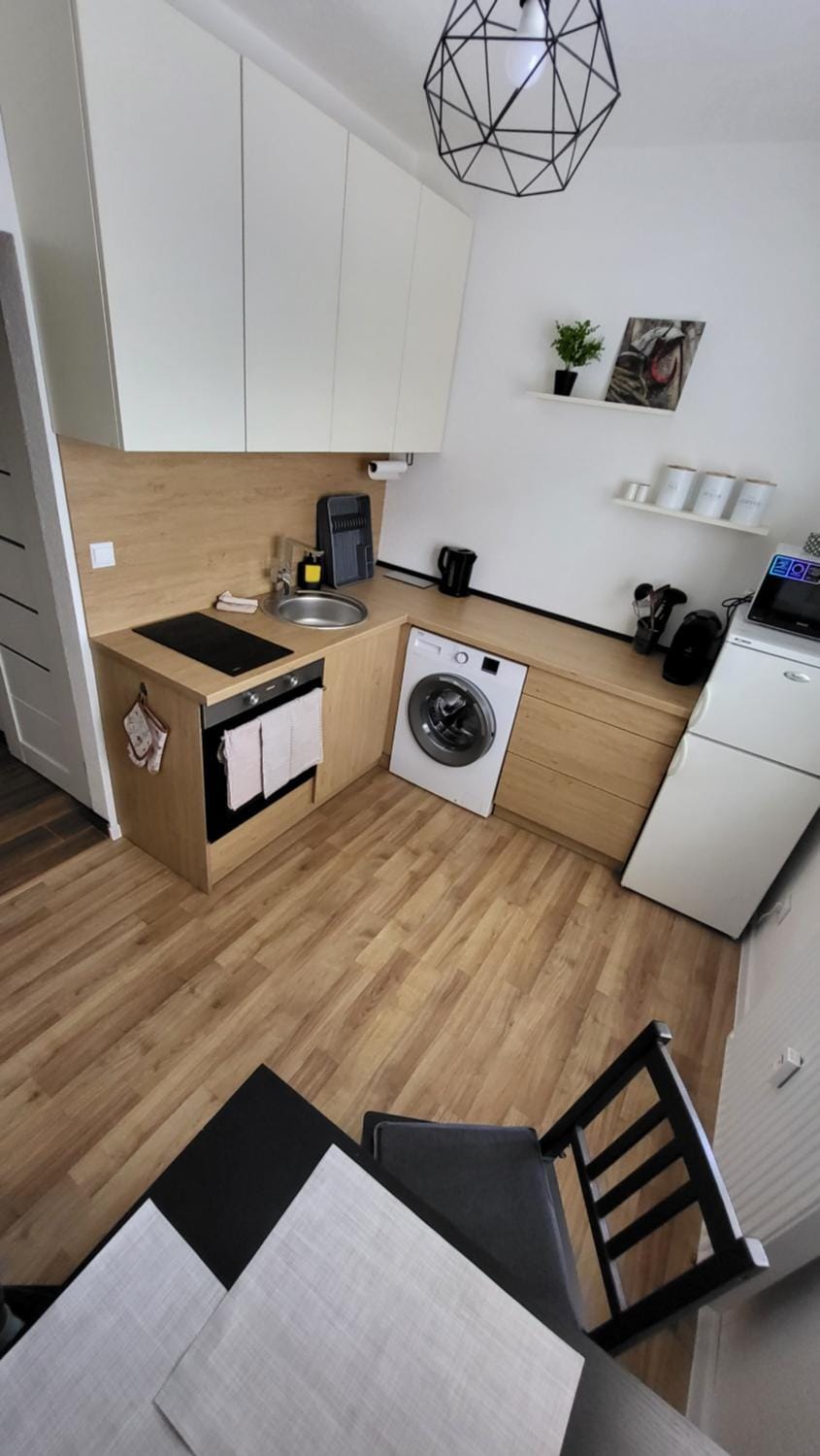 Kitchen or kitchenette, washing machine