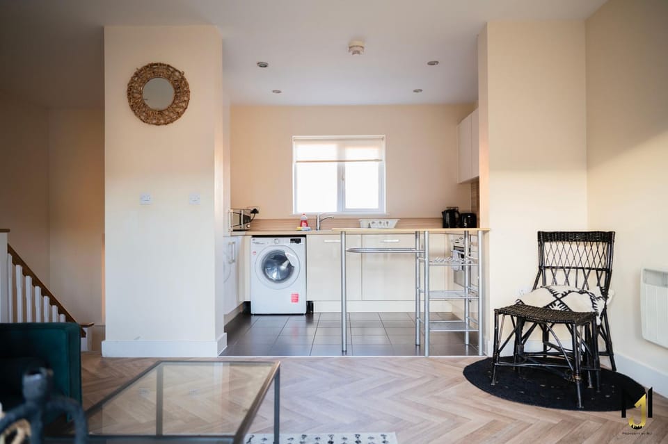 Kitchen or kitchenette, Living room, Seating area, washing machine