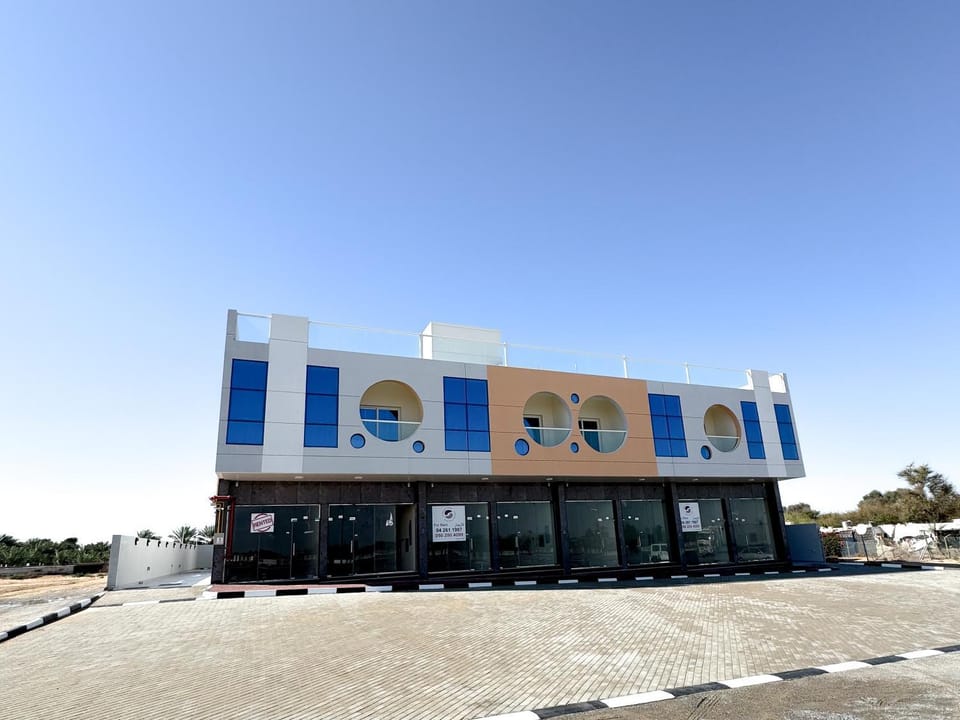 Property building, Day, Parking