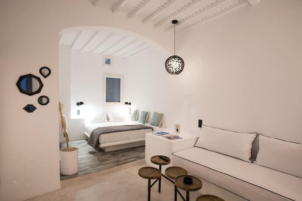 Bed, Living room, Seating area, Bedroom