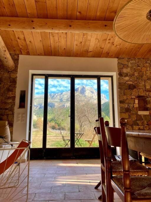Natural landscape, View (from property/room), Living room, Seating area, Mountain view