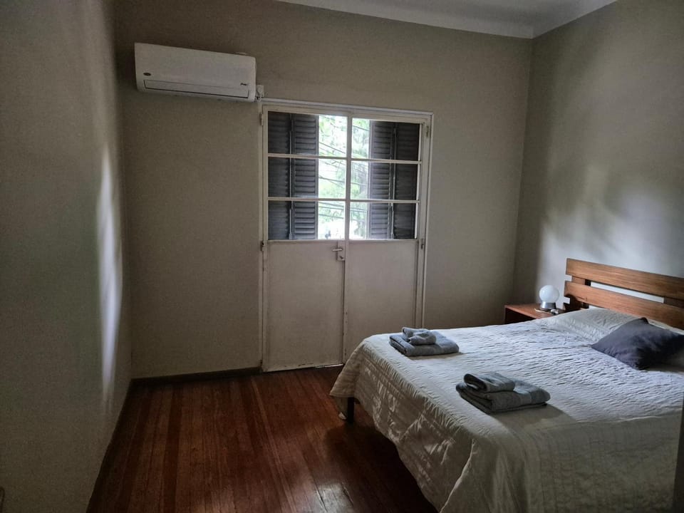 Bed, Photo of the whole room, Bedroom, towels, air conditioner