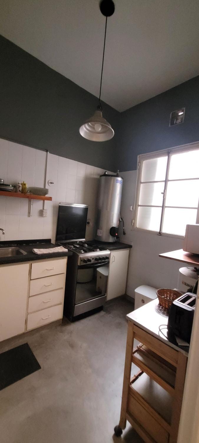 Kitchen or kitchenette, microwave, oven, stove, toaster