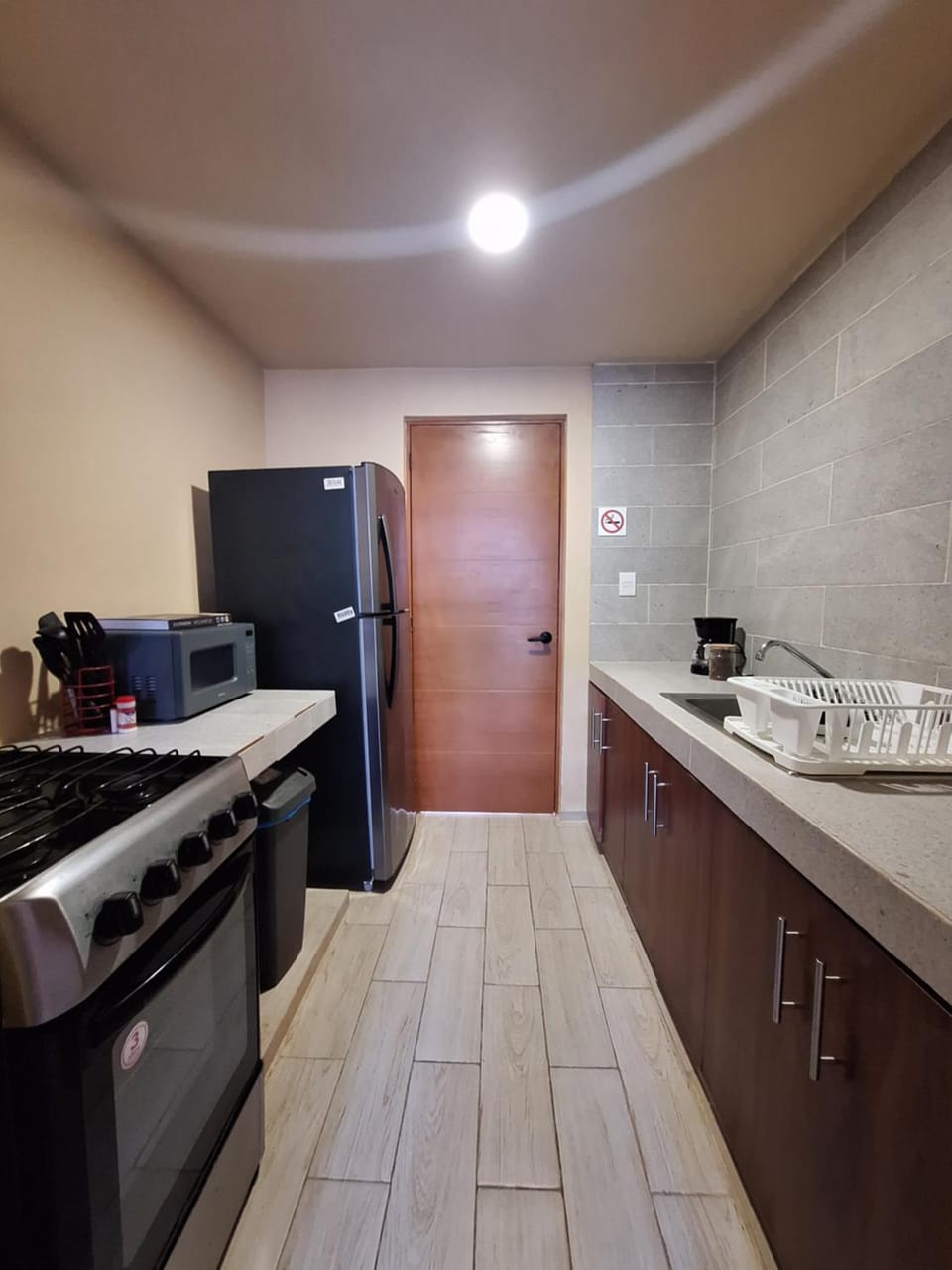 Kitchen or kitchenette, oven, stove, toaster