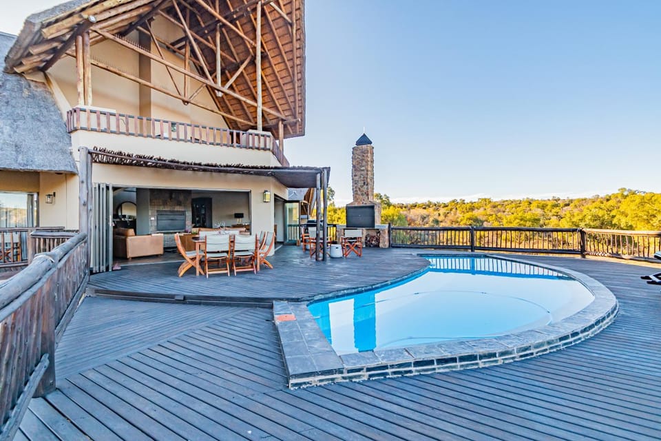 Property building, Patio, Day, Natural landscape, View (from property/room), Balcony/Terrace, Pool view, Swimming pool