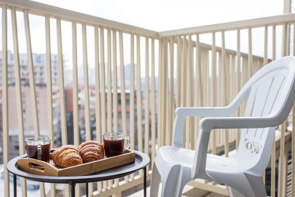 1-Bedroom Apartment with City Views - Balcony - 5 Min to Delisi Metro - Self Check-In - m2 Complex, Saburtalo Apartment in Tbilisi, Georgia