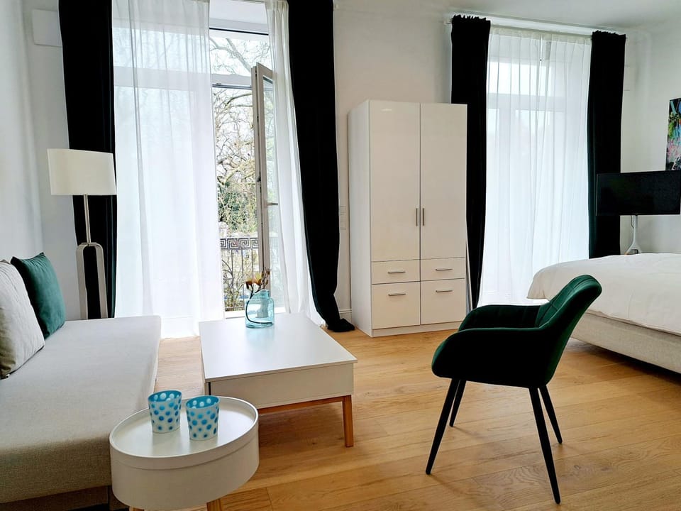 Bed, Seating area, wardrobe