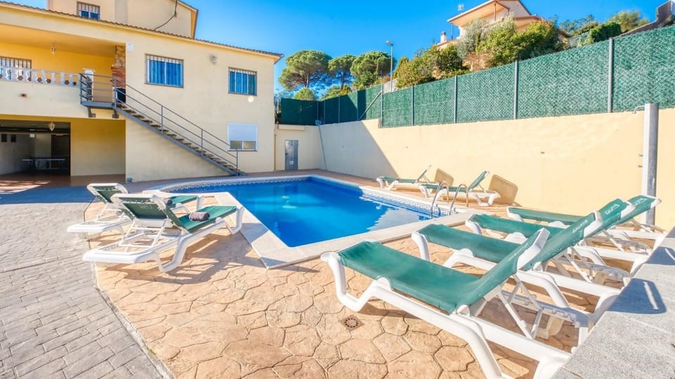 Property building, Living room, Swimming pool