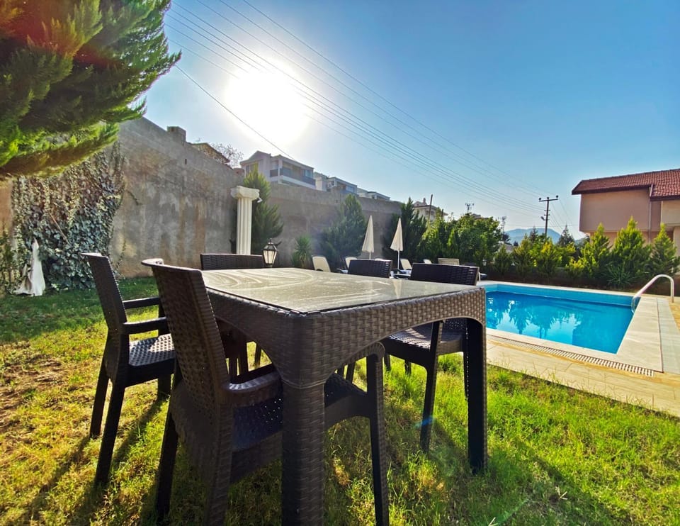 Patio, Garden, Garden, Seating area, Dining area, Swimming pool, sunbed