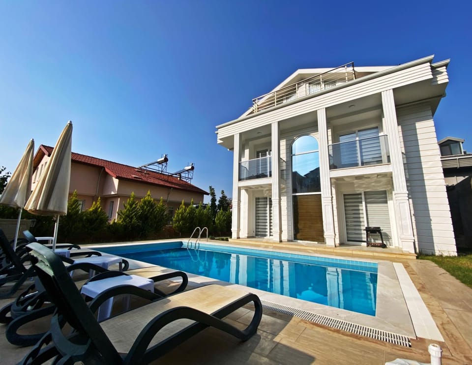Patio, BBQ facilities, Swimming pool, sunbed