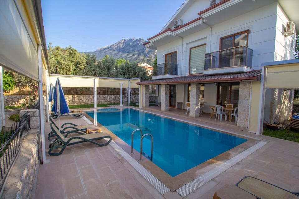 Patio, Dining area, Mountain view, Swimming pool, Swimming pool, sunbed