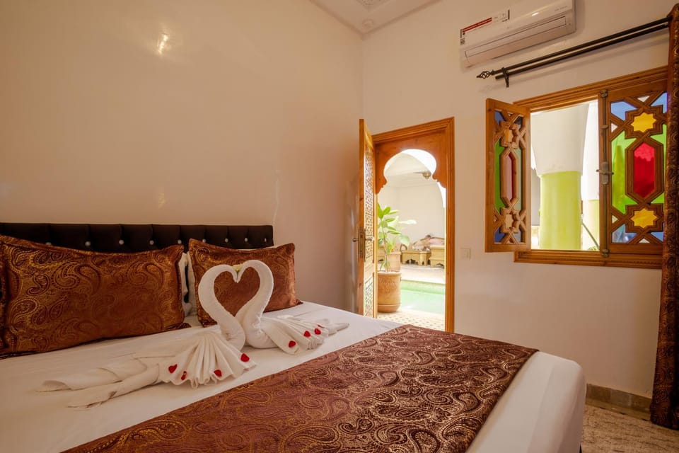 Bed, Photo of the whole room, Bedroom, towels, air conditioner