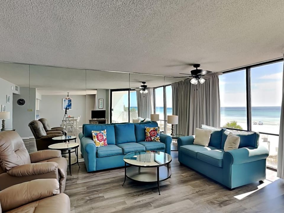 View (from property/room), Living room, Seating area, Beach, Sea view, furniture