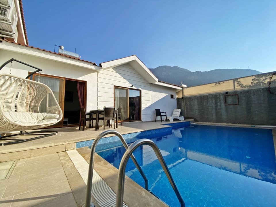 Patio, Dining area, Swimming pool