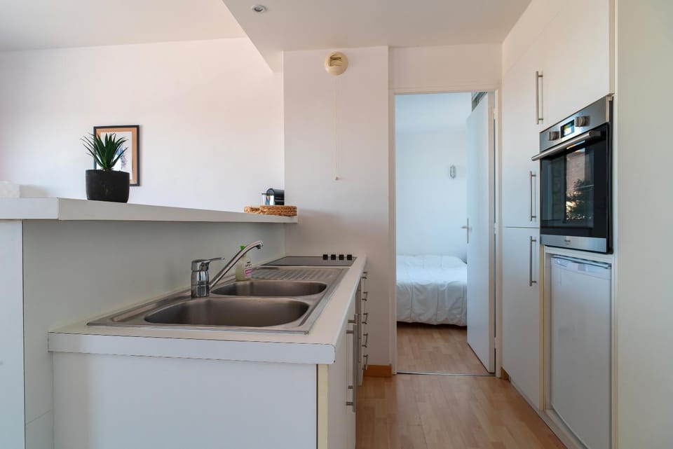 Kitchen or kitchenette, stove