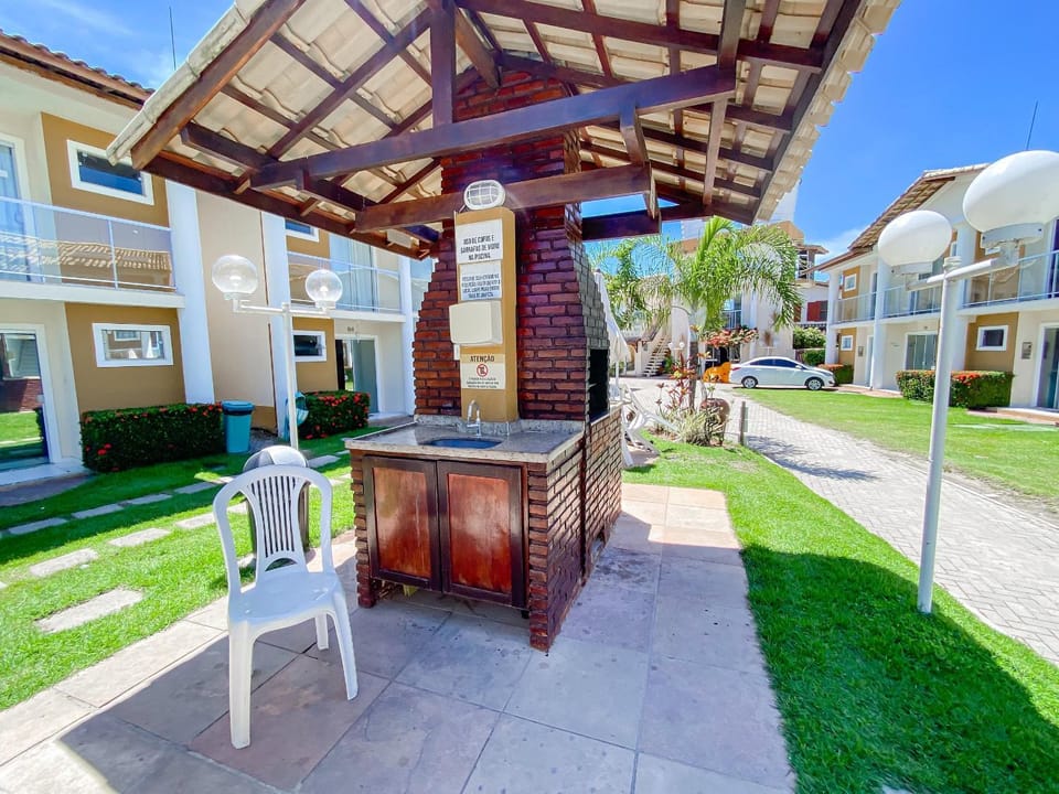 Ground floor apartment with 1 suite near Taperapuã Beach, condominium with swimming pool, sauna, and 24-hour security Apartment in State of Bahia