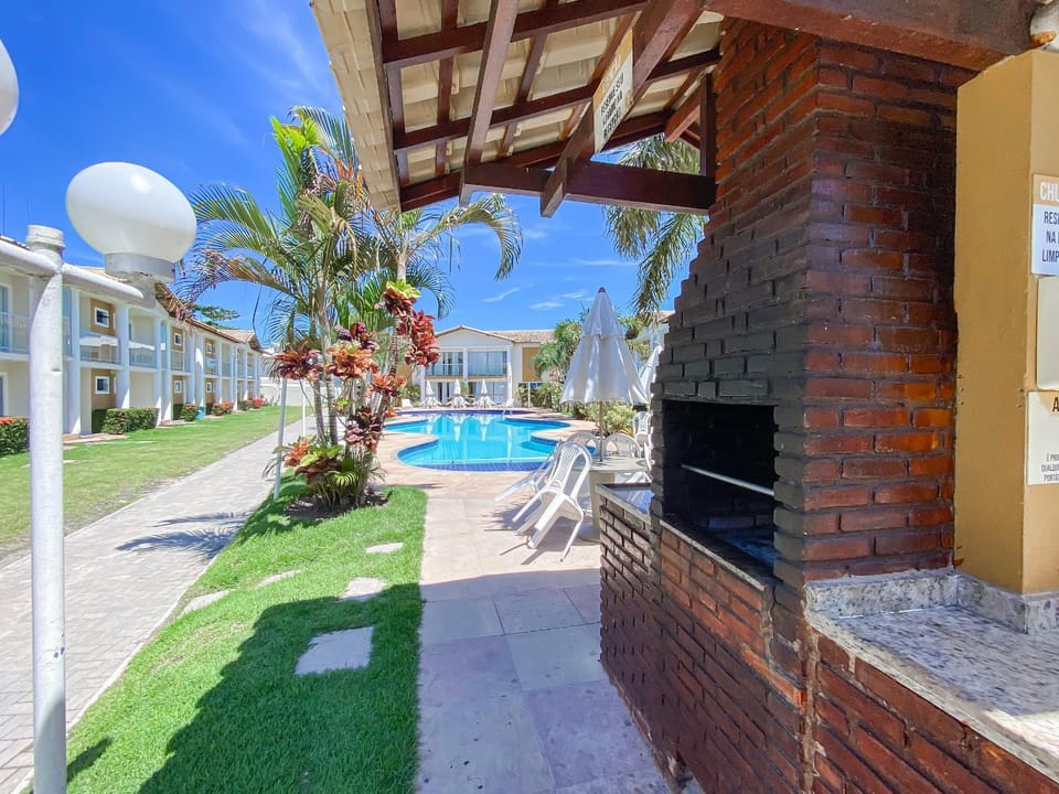 Ground floor apartment with 1 suite near Taperapuã Beach, condominium with swimming pool, sauna, and 24-hour security Apartment in State of Bahia