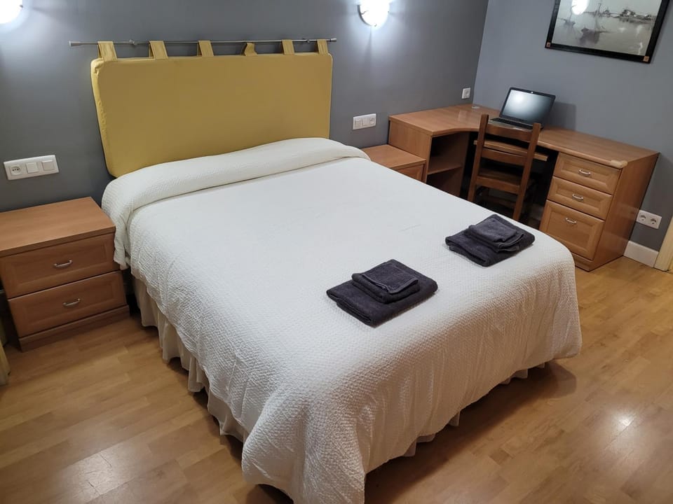 Bed, Photo of the whole room, hair dresser, towels