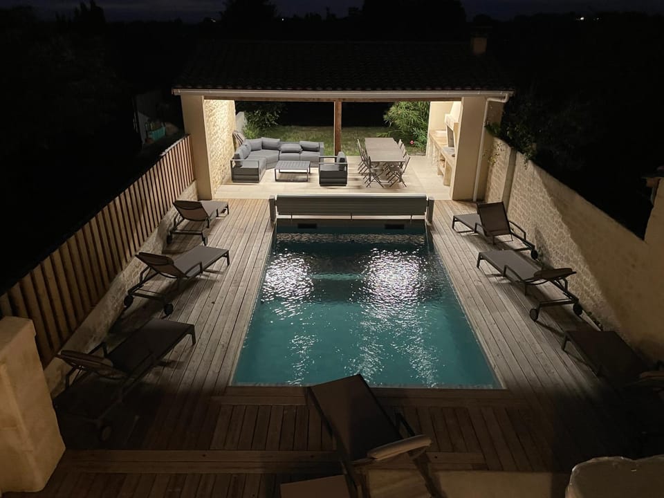 Patio, Night, BBQ facilities, Pool view, Swimming pool, sunbed