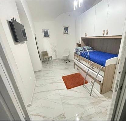 Bed, TV and multimedia, View (from property/room), Photo of the whole room, Bedroom, bunk bed, hair dresser, internet, locker, wardrobe, air conditioner