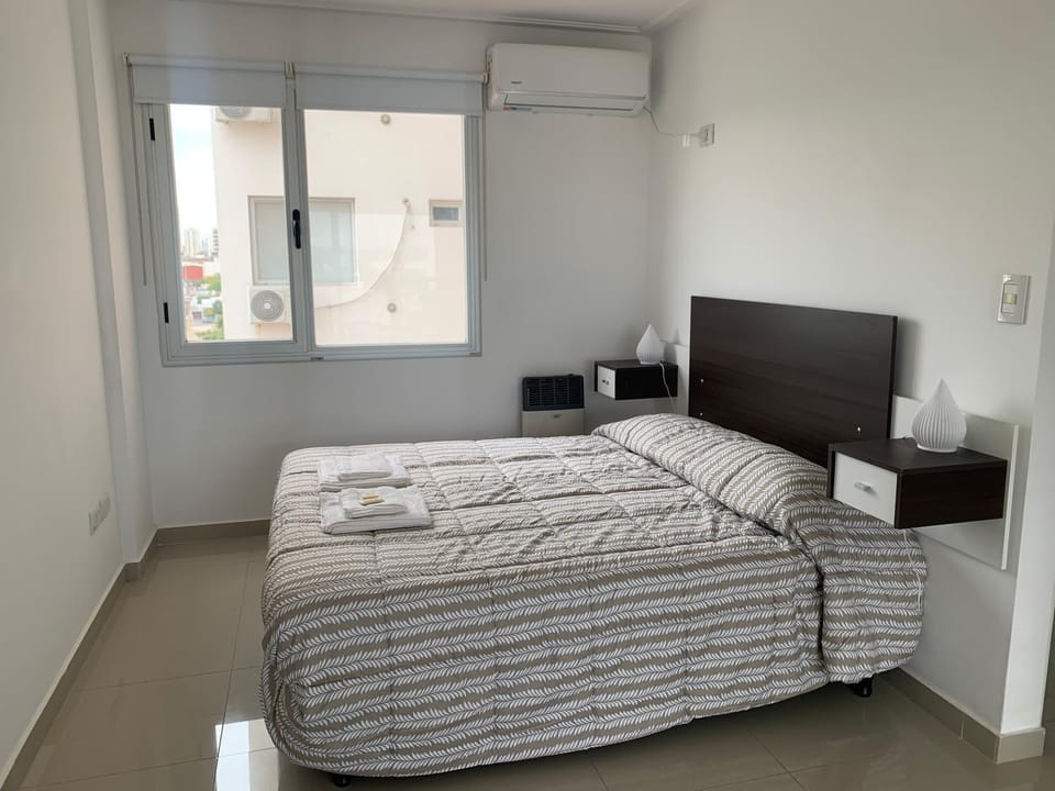 Bed, Photo of the whole room, Bedroom, towels, air conditioner