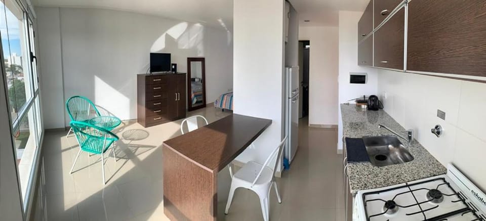 TV and multimedia, Kitchen or kitchenette, Living room, Seating area, Dining area