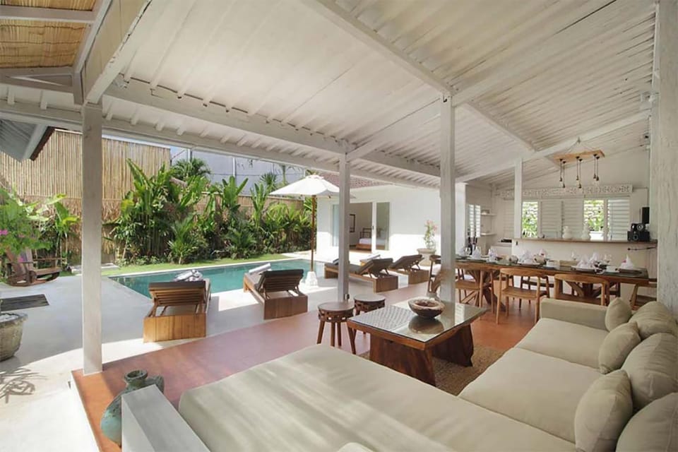 Living room, Seating area, Pool view