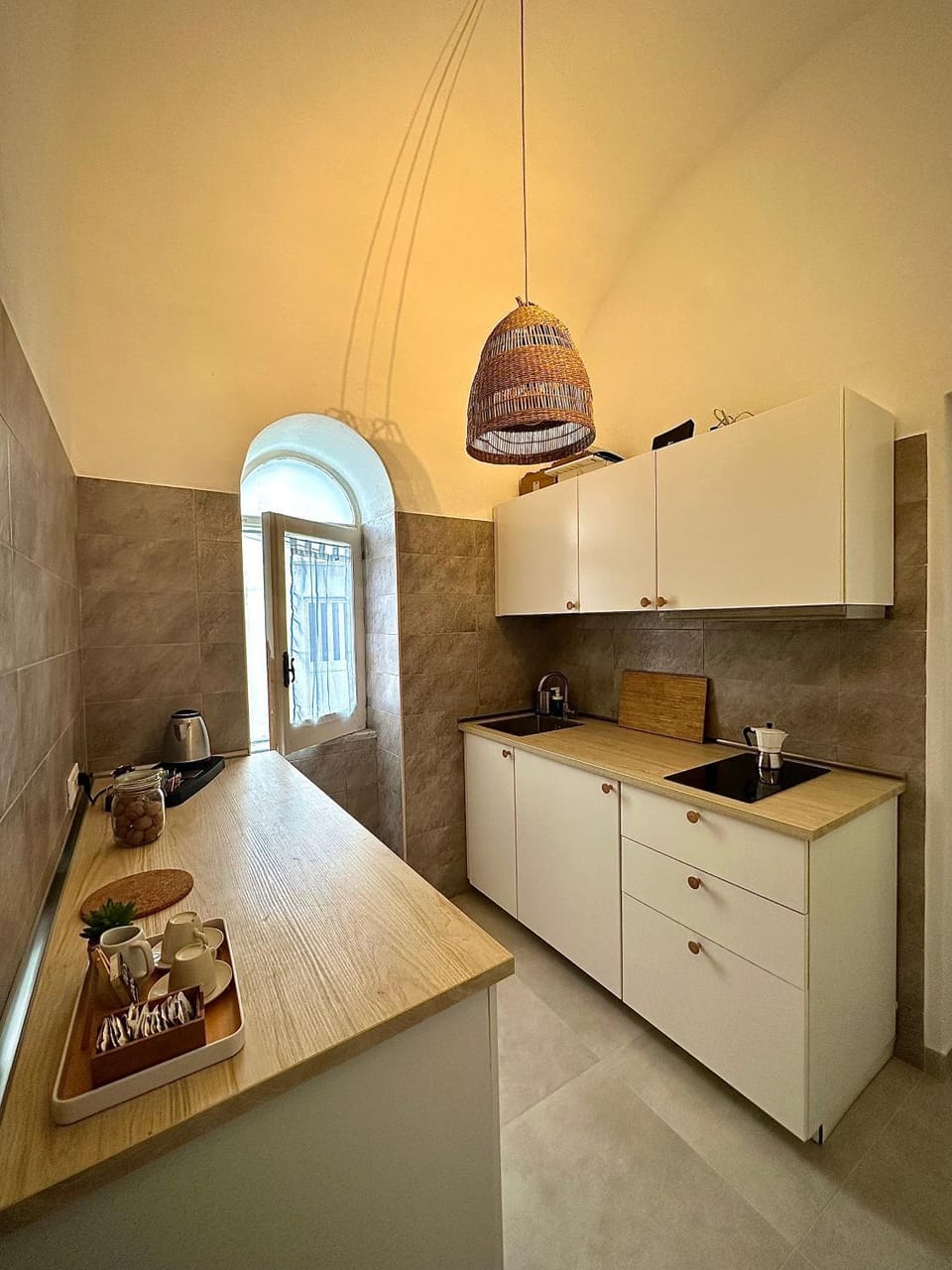 Kitchen or kitchenette, stove, washing machine
