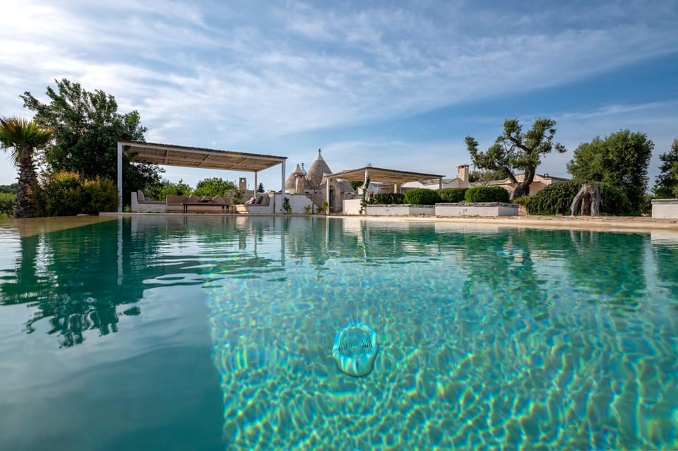 Property building, Living room, Swimming pool