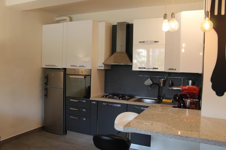 Kitchen or kitchenette, stove