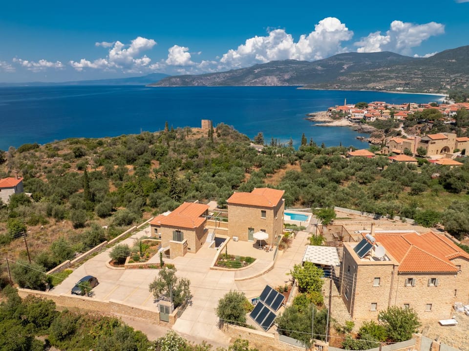 Property building, Nearby landmark, Day, Neighbourhood, Natural landscape, Bird's eye view, City view, Mountain view, Sea view, Street view