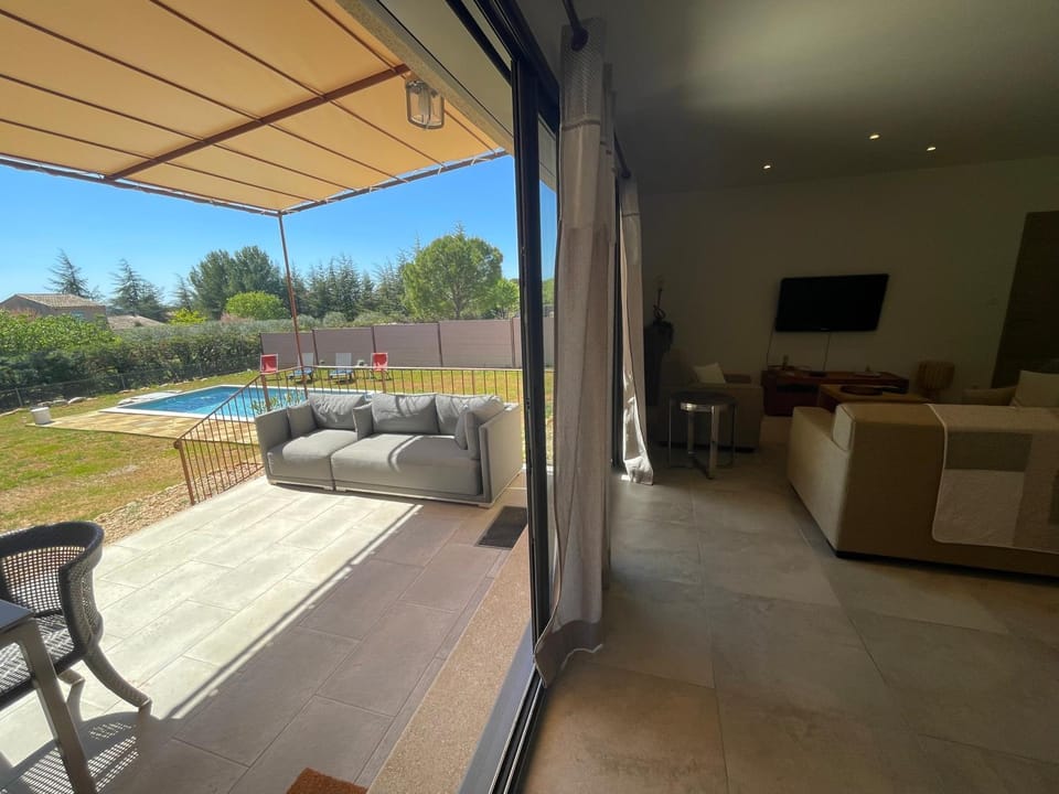 Patio, Living room, Pool view